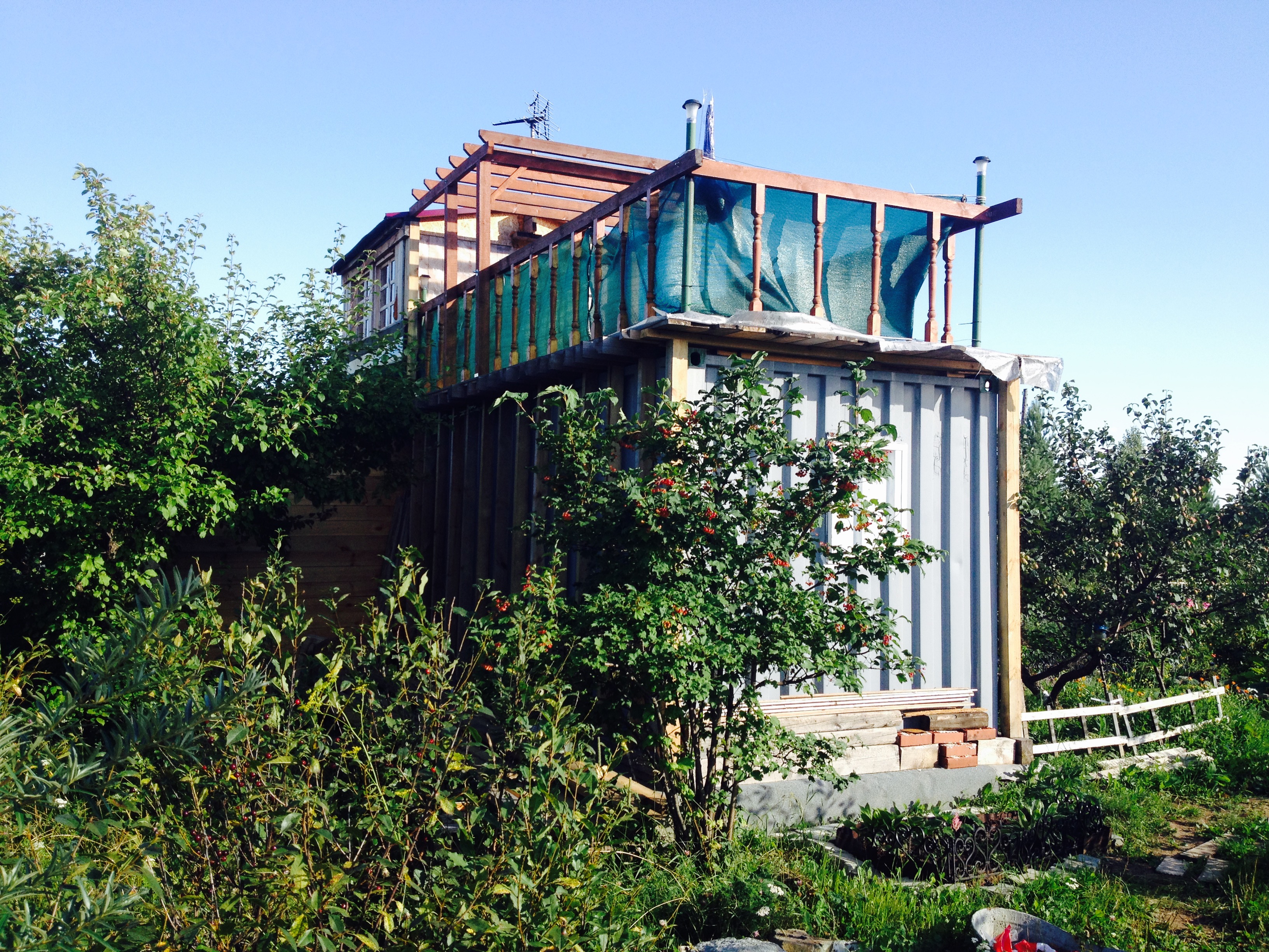 House from the container in the garden